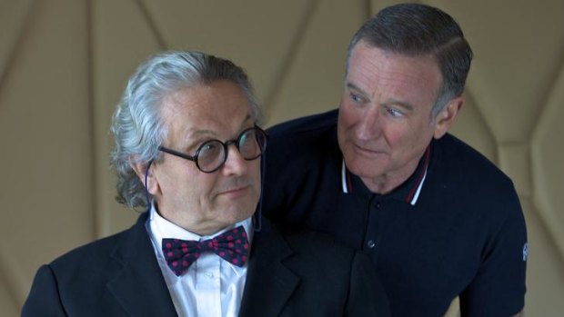Dr George Miller with his Happy Feet voice star Robin Williams.