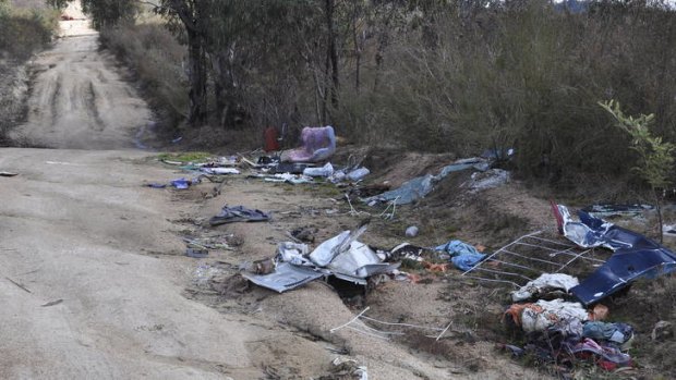 An assortment of rubbish - including a kitchen sink - dumped near Gibraltar Peak on the edge of Tidbinbilla Nature Reserve.