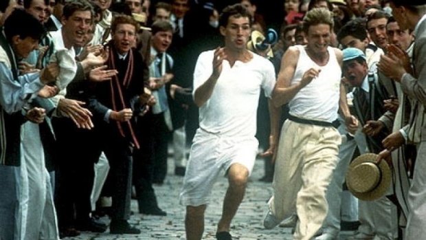 Full tilt: Ben Cross and Nigel Havers compete to get around the main court at Trinity College, Cambridge, in less time than it takes the clock to strike 12 in <i>Chariots of Fire</i>. 