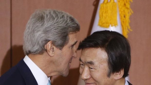 US Secretary of State John Kerry speaks with South Korean Foreign Minister Yun Byung-se.
