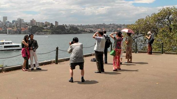 Growth sector: Tourists from China at Mrs Macquarie's Chair.