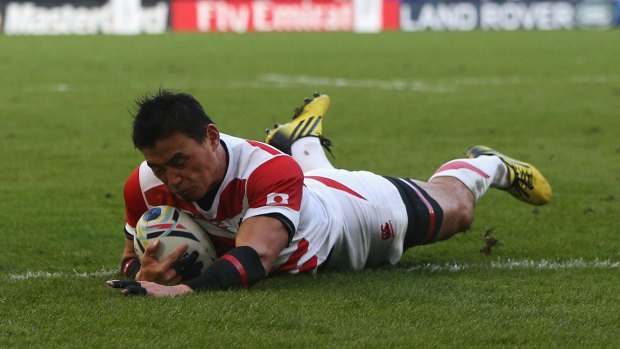 Try time: Reds recruit Ayumu Goromaru dives over to score his team's second try against South Africa on September 19.