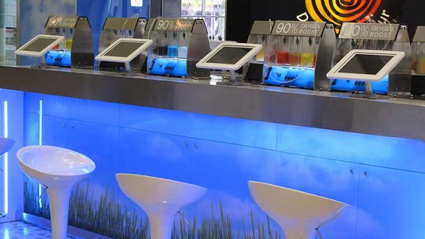 Bar fly ... a belt of pure oxygen for $1 a minute at the new O2 bar at Darling Harbour.
