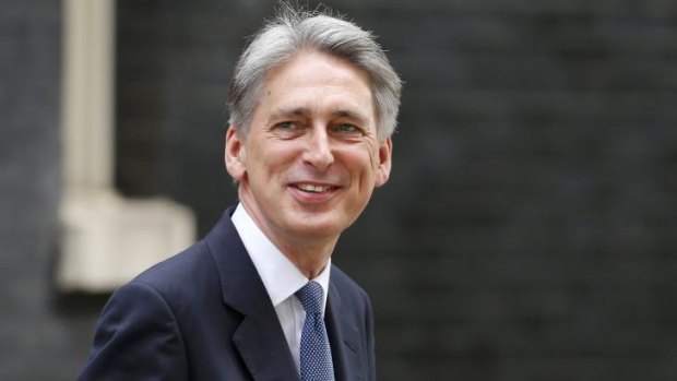 Eurosceptic: Britain's new Foreign Secretary Philip Hammond arrives at 10 Downing Street on Tuesday.