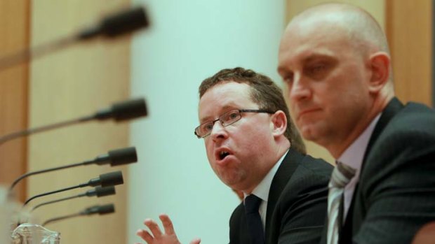 Pressure &#8230; CEO Alan Joyce, left, with Jetstar CEO Bruce Buchanan, told a Senate committee the airline's competitiveness was hit by the high Australian dollar.