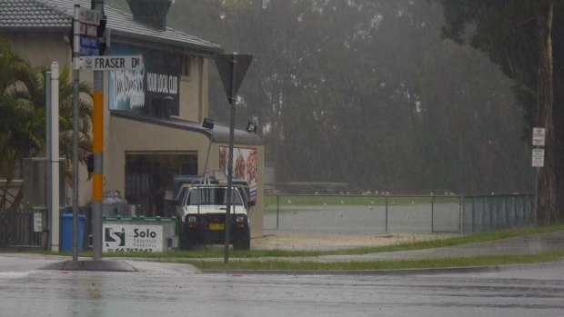 Drenching rain ... Twin Towns Juniors Club, corner of Leisure and Fraser drives, Banora Point.