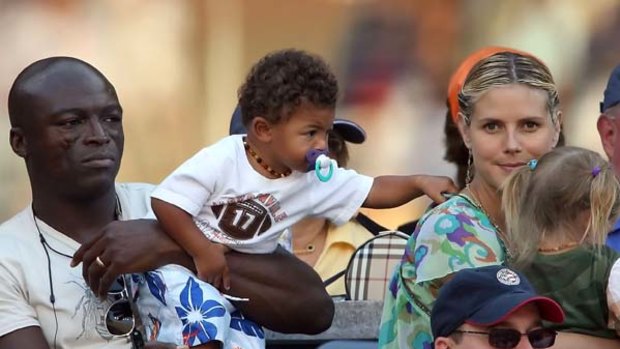 Parent time . . . Heidi Klum with her husband Seal and two of their four children.