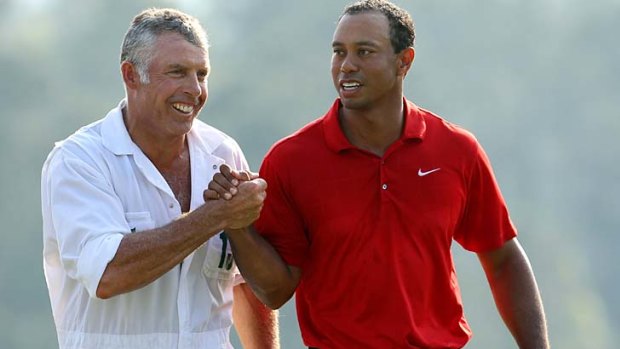 The good old days ...  Tiger Woods, right, and Steve Williams walk off during the final round of the 2011 Masters Tournament at Augusta in April.