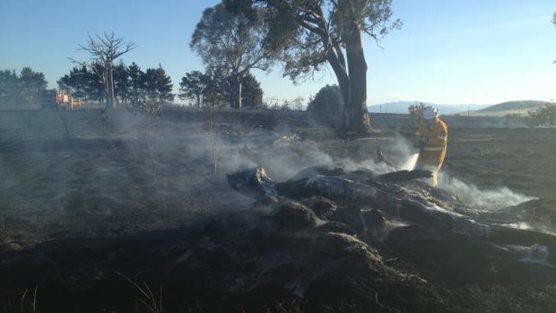 Fire fighter mopping up at  Wallaroo.