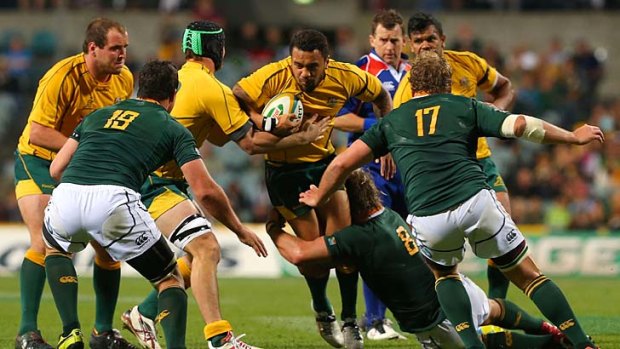 Breakthrough ... Digby Ioane takes on the Springboks' defence earlier this month.
