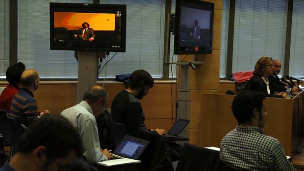 Tyler Hamilton testifies via a video link from the Spanish Embassy in Washington, during the Operacion Puerto doping trial in Madrid.