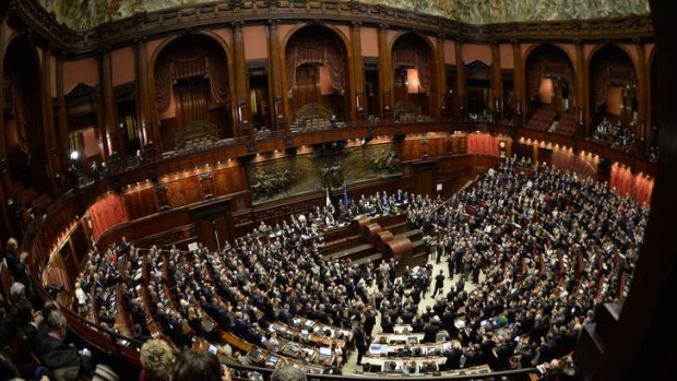 Appeal: Members of Italy's parliament, who persuaded Giorgio Napolitano to accept an unprecedented second term as president.
