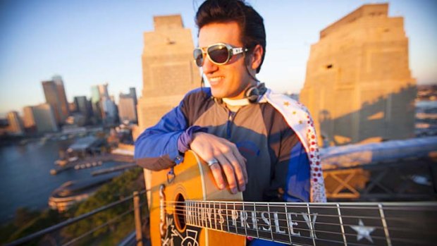 All Shook Up ... Anthony Petrucci marks the anniversary of Elvis Presley's death on top of the Harbour Bridge.