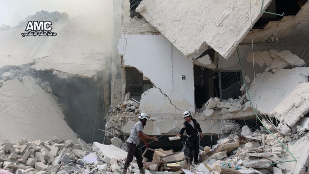 Aleppo after being hit by barrel bombs. US has doubts about Russia's intentions in Syria. 