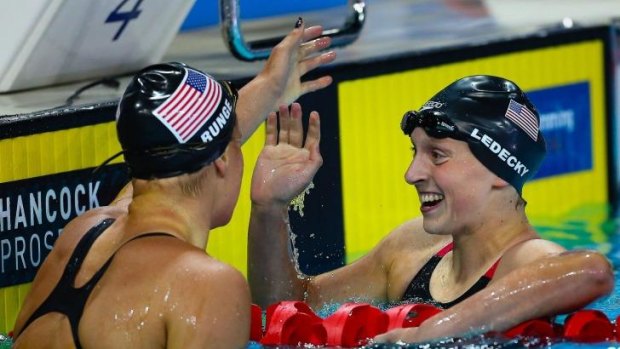  Ledecky celebrates after the 400-metre freestyle final on the Gold Coast. 