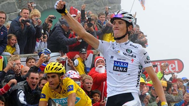 Andy Schleck celebrates winning the stage ahead of Alberto Contador.