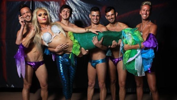 Fish out of water: The Beyonce G-Spot Memorial Mermaid Float crew with mermaid Marie Claire held up by (from left) Caleb Kleinig, Liam Barrett, Brett Nolan, Neil Singleton and Simon Drew.