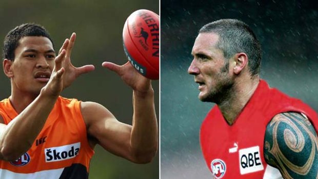 A different league ... Israel Folau, left, catches the ball while training with the GWS Giants at Blacktown. Right, former Sydney Swan Peter Everitt.