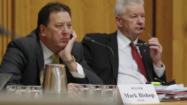 Senator Mark Bishop, left, says  Labor should pass the Abbott government's budget.