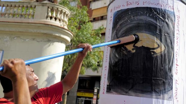 Final call ... posters go up in Barcelona for the city's last bullfight on September 23 before the combat is banned for good from the Spanish region.