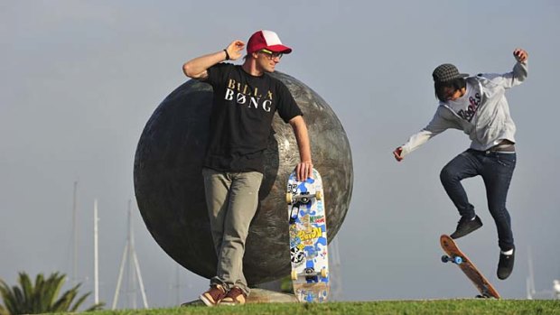 Professional skateboarder Renton Millar, front, is happy with the location of the planned site. With him is John Szetho.
