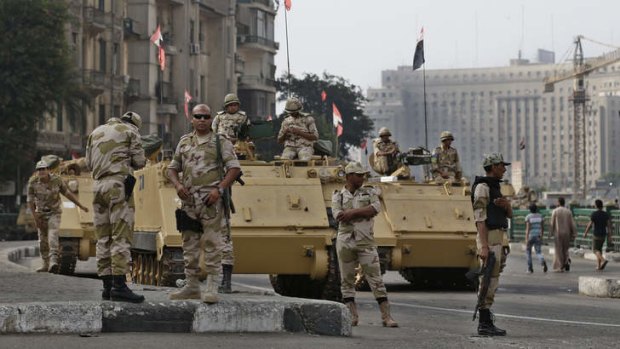 Egyptian troops on the streets of Cairo. Islamic scholars have been advising soldiers they have a religious duty to use deadly force against Muslim Brotherhood supporters.