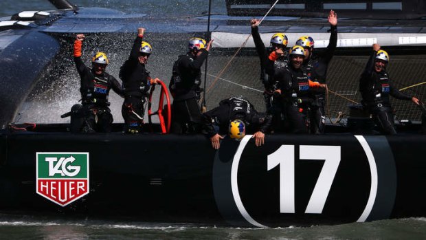 Miracle comeback:  Oracle Team USA celebrates after defending the cup.