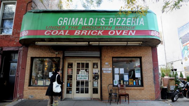 Battleground ... Grimaldi's Pizzeria, which features a coal brick oven, near the Brooklyn Bridge.
