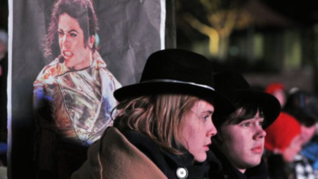 Michael Jackson fans endure the cold to say farewell at Melbourne's Federation Square.