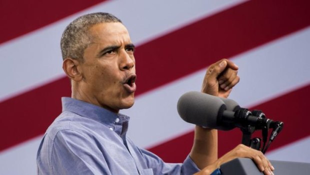 Back on the stump: Barack Obama strikes a more confident note at a labour rally in Milwaukee.
