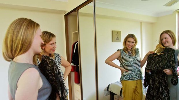 You flatter me ... client Jayne Dance (left) gets a little help from style consultant Ashleigh Sharman.