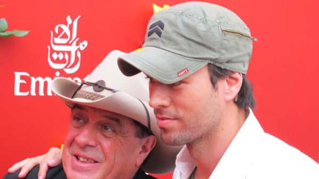 Molly Meldrum with singer Enrique Iglesias in the Emirates marquee.