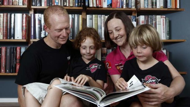 Mike,  Willoughby, Connie and Hamilton reading at home in Kingston.