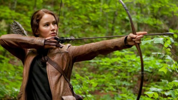 Jennifer Lawrence as Katniss Everdeen still has Bullock in her sights.