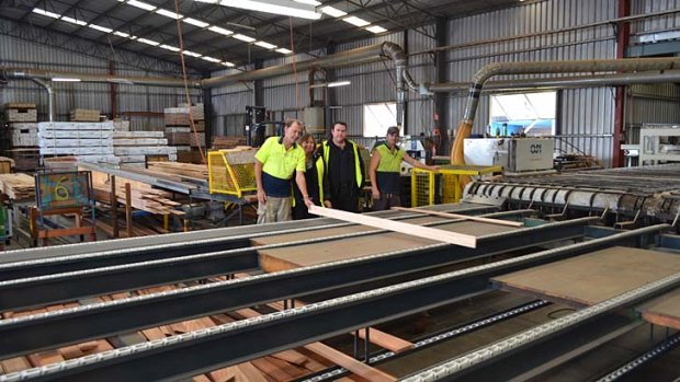 "Battling for survival": Gary Hawtin, Lexie Hudson, Allan Hutley and Nathan Yates at the Australian Solar Timbers mill at Kempsey.