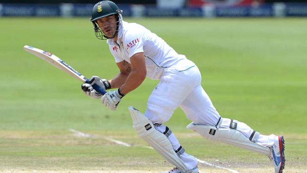 Faf du Plessis sets off for a single during the second session of play.