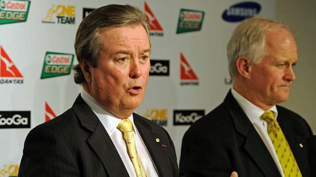 John O'Neill (left) talks to the media yesterday as Australian Rugby Union chairman Michael Hawker looks on.