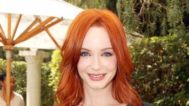 Driving men mad ... Christina Hendricks makes the most of her curves.