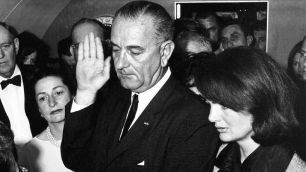 Lyndon B Johnson is sworn-in as 36th President of the United States.