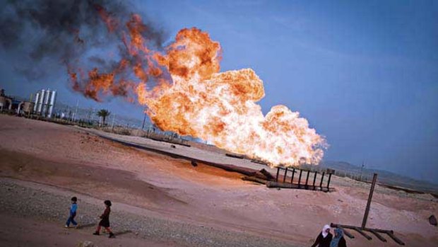 An oil well flares in Kirkuk. Iraq’s reserves are estimated at 230 billion barrels.