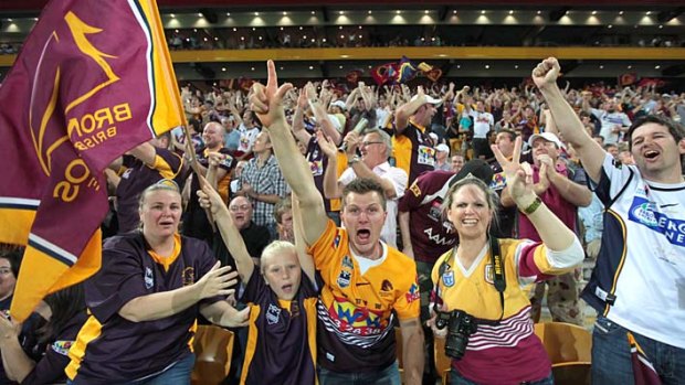 A full house of Brisbane Broncos fans celebrating a victory at Suncorp Stadium.