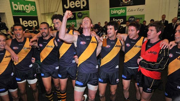 The tigers celebrate a win against Fremantle last week.