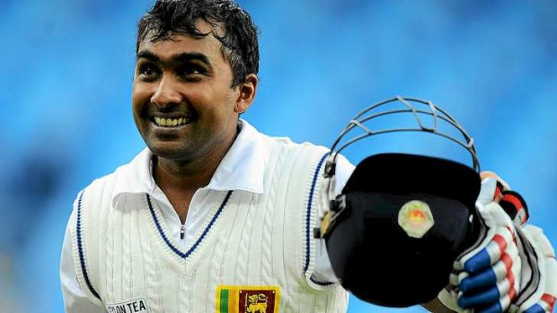 All smiles: Sri Lankan batsman Mahela Jayawardene leaves the pitch at the end of the second day after scoring an unbeaten century.
