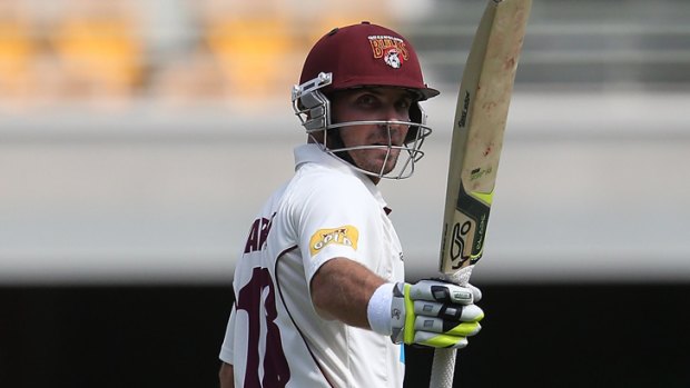 Chris Hartley of the Bulls celebrates his half century during day three of the Sheffield Shield match between Queensland and South Australia.