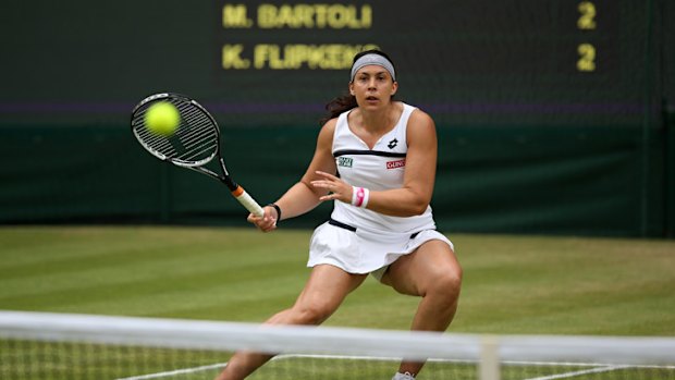 France's Marion Bartoli on her way to defeating Belgian Kirsten Flipkens.