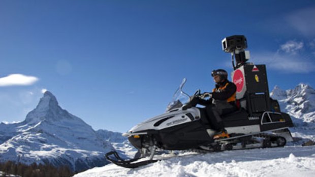 Thomas Imboden drives a Google Inc. camera-equipped snowmobile close to Matterhorn mountain in Zermatt, Switzerland, on Monday, Feb. 21, 2011. Mountain View, California-based Google, the web's biggest search engine, is planning to map 350 kilometers (218 miles) of downhill runs in the Swiss Alps to add to its offering of online road maps and street-level photography, the company said in an e-mailed statement. Photographer: Olivier Maire/Keystone/Google Inc. via Bloomberg EDITOR'S NOTE: EDITORIAL USE ONLY. NO SALES.
