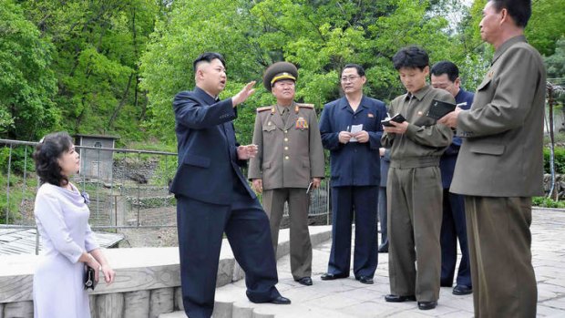 North Korean leader Kim Jong-Un and his wife Ri Sol-Ju in a photo released by the North Korean state media on May 20.