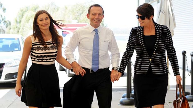 Tony Abbott yesterday with wife Margie, right, and daughter Frances.