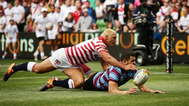 England's Ryan Hall  is controversially denied a try by Australia's Greg Inglis.