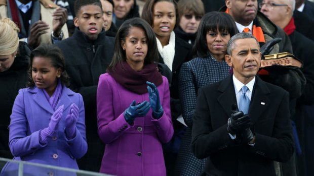 Second term ... Barack Obama with his family behind him.